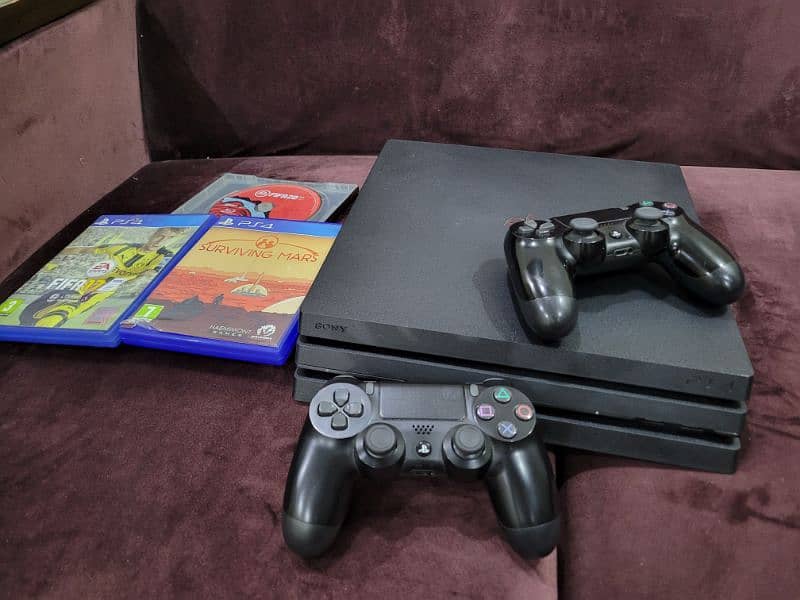 Ps4 pro 1tb with 2 controller and cds 2