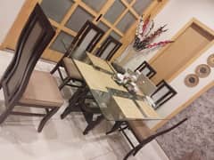 Complete wooden Dining Table with six chairs and glass topss top