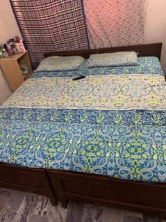 urgent 2 single bed for sale without mattress