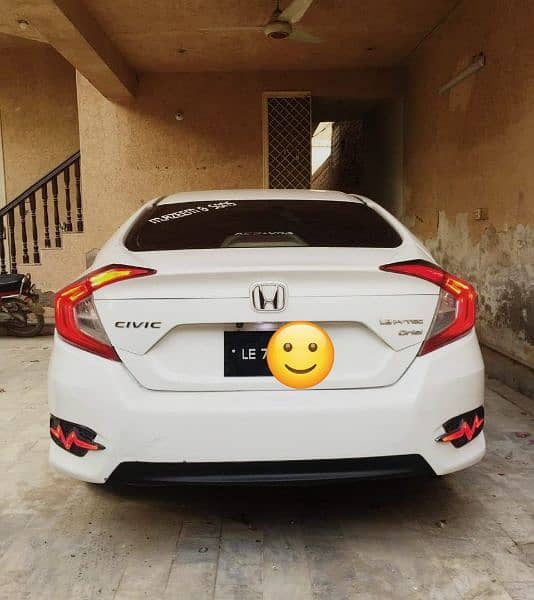 Honda Civic VTi Oriel 2016 white Lahore number 033/69-800/157 4