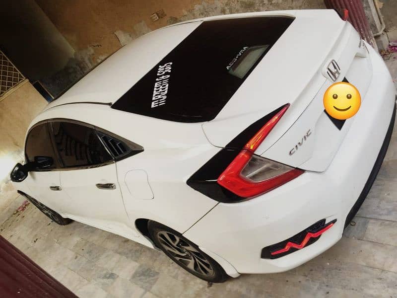 Honda Civic VTi Oriel 2016 white Lahore number 033/69-800/157 15