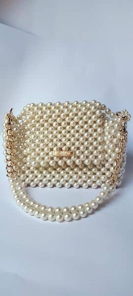 Brand new hand made white pearls bag 1