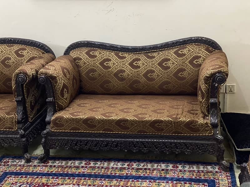 used 6 seater shesham sofa set for sale urgently. condition 10 by 10 1