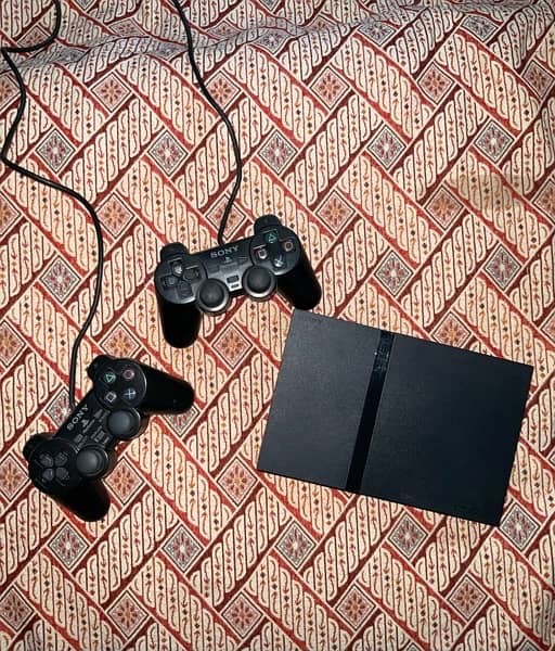 Playstation 2 for sale new condition with games 0