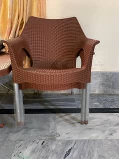 3 Plastic Chairs and table Set available for sale