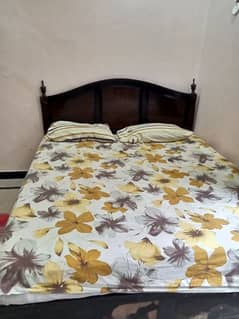 double bed with spring mattress