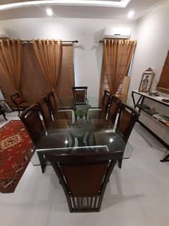 Solid wood Glass top dinning table with 8 chairs