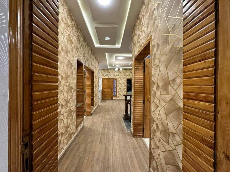 Pvc Wallpaper. Pvc Wall panelling. Wooden Pvc Flooring. Media wall 1