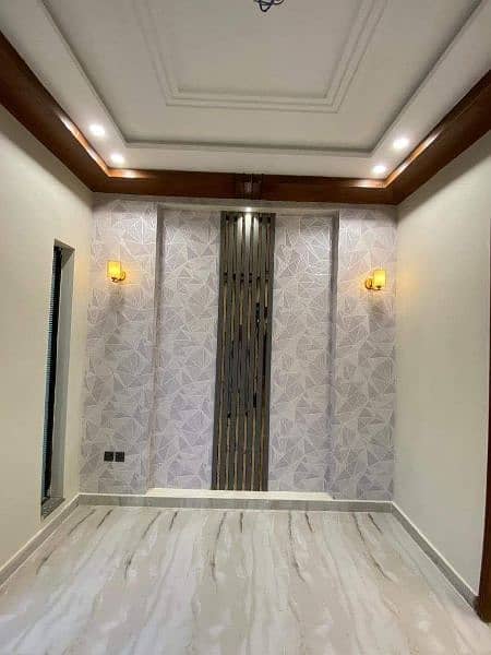 Pvc Wallpaper. Pvc Wall panelling. Wooden Pvc Flooring. Media wall 15