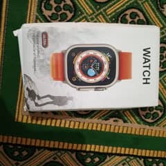 Ultra  Watch with Orange strap wireless charger