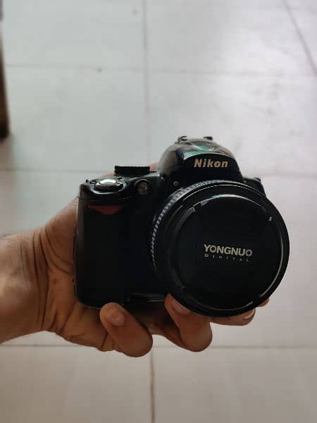 Nikon D-5000 Dslr with Yongnuo 50 mm lens | Price 22000/- 2