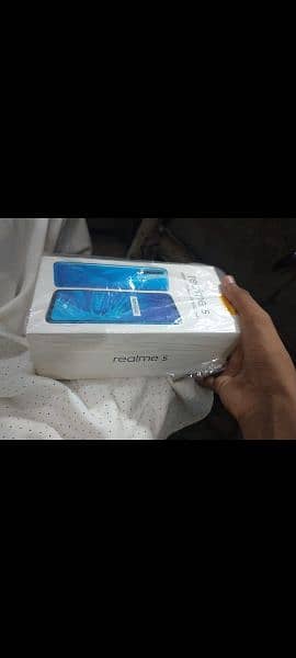 realme 5 with box 4/64 he WhatsApp number 03163660214 2