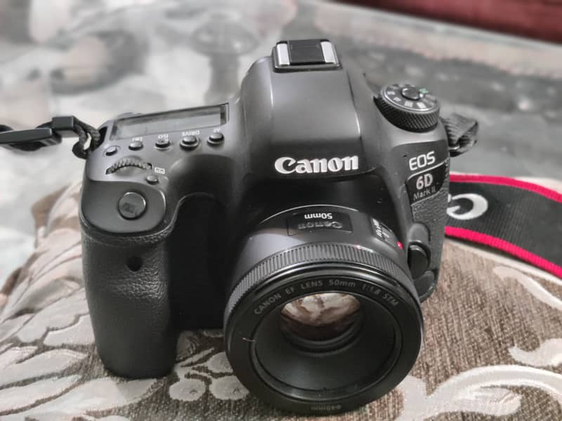 canon 6D mark II body with 70-200 mm lens and 14mm ultra wide lens 6