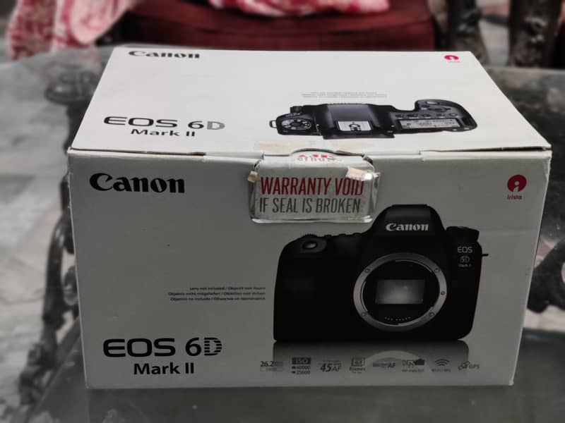canon 6D mark II body with 70-200 mm lens and 14mm ultra wide lens 7