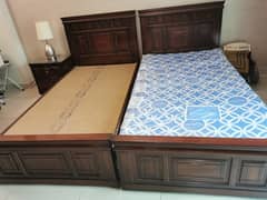 Two Single Beds (almost new) with one mattress alongwith side table 0