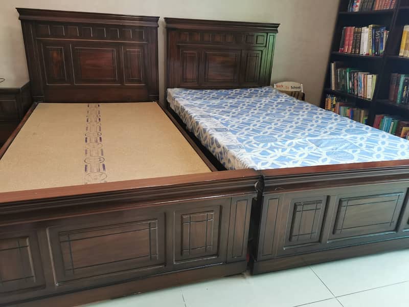 Two Single Beds (almost new) with one mattress alongwith side table 2