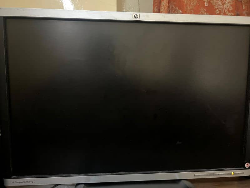 Hp Compaq LA2405wg monitor. 0