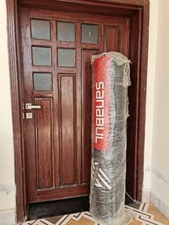 punching bag 5ft , filled , with 2 pair of gloves ! hanging assembly