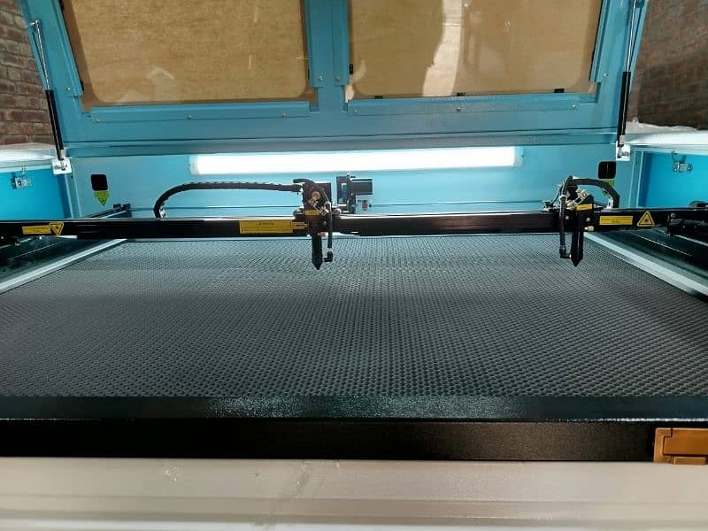 Laser cutting machine 12