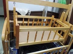 good condition baby cot with swing