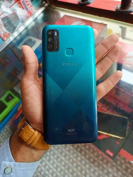 infinix hote 9 play 10 by 10 condition green colour 3/64 with box 0