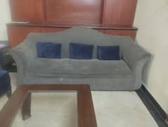 3 seater sofa with blue color cushions 0