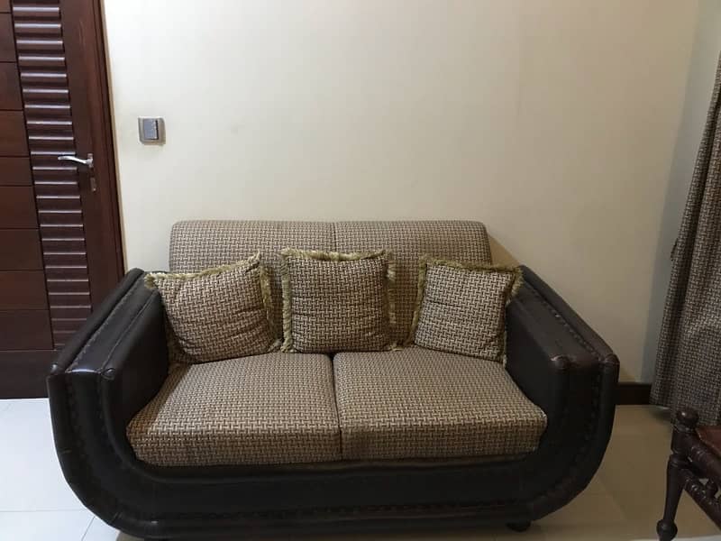 Leather Sofa set with cushions in cross-stitch design. 1