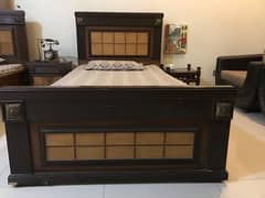 Handmade, wooden bedroom set with antique touch.