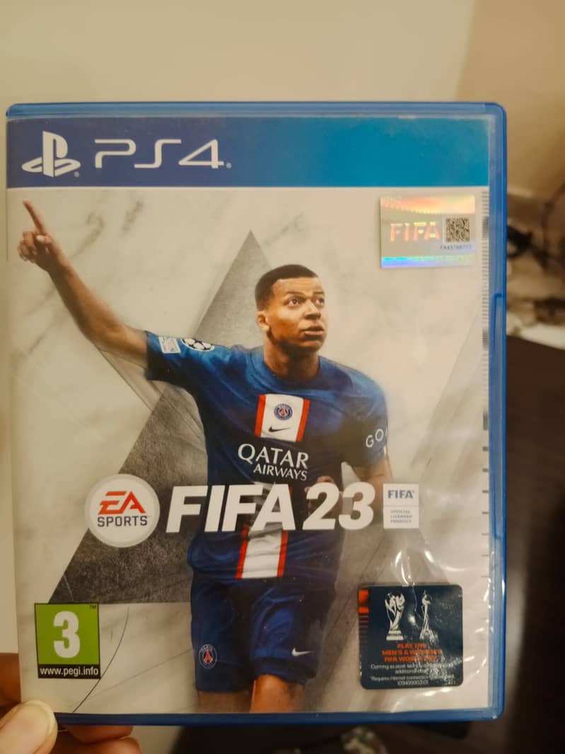 PS4 Slim 500gb with 2 controllers and FIFA 23 1