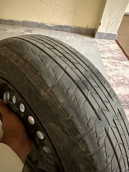 145-80-R13 used tyre with rims 7