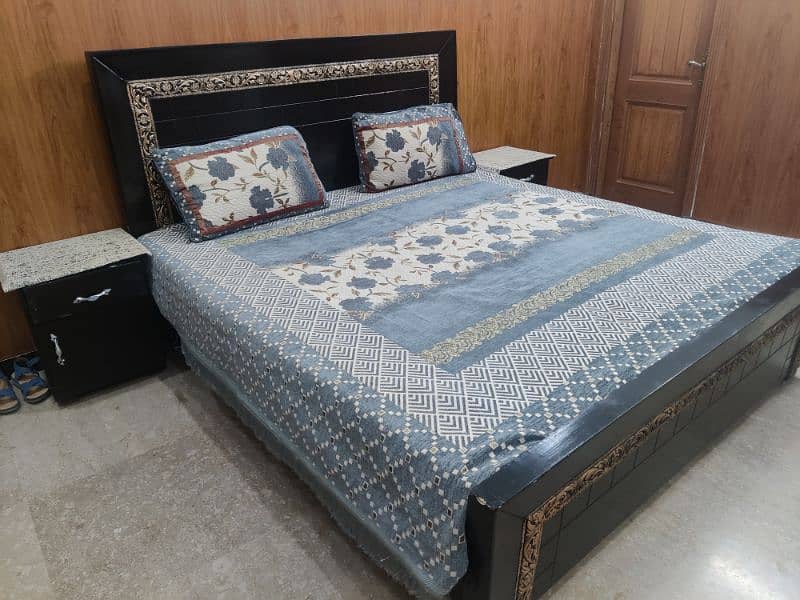 wooden double  bed  with side tables and mattress 6
