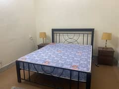wrought iron bed with mattress