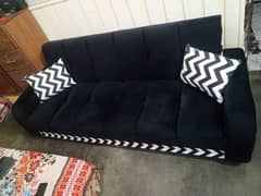 beautiful black sofa cum bed new for sale