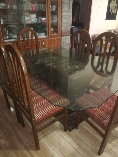 dinning table with glass top and 6 chairs 3