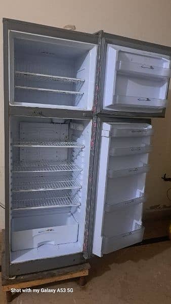 used fridge,  large size , 09/10 condition 1