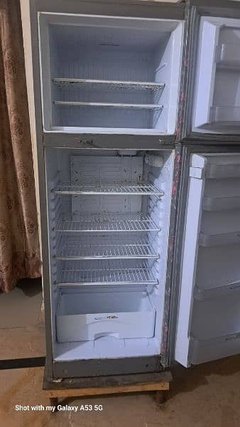 used fridge,  large size , 09/10 condition 2