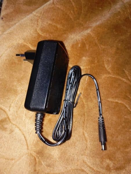 power adapter for laptop and internet modem 1