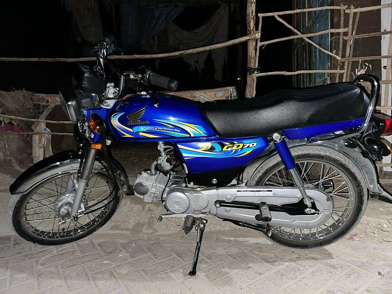 Honda CD70 2024 4