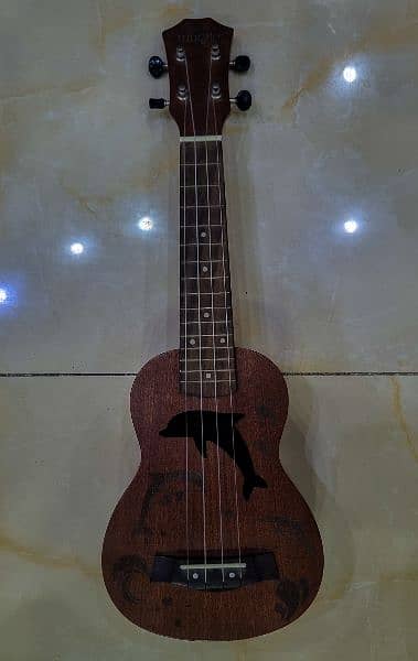 Full size ukulele. barely used, perfect condition. 3