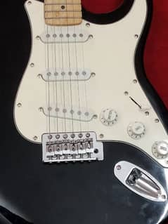 electric guitar with amplifier