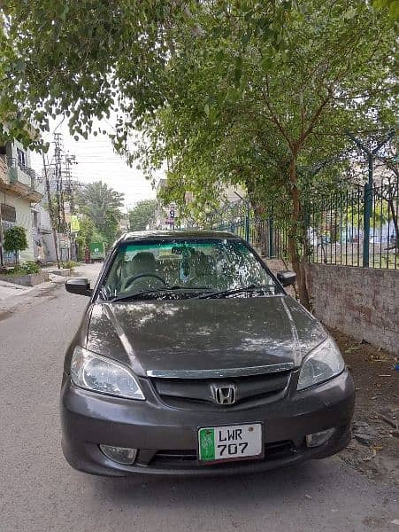 Honda Civic Prosmetic 2006 alloy wheels good condition own my name 4