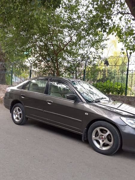 Honda Civic Prosmetic 2006 alloy wheels good condition own my name 7
