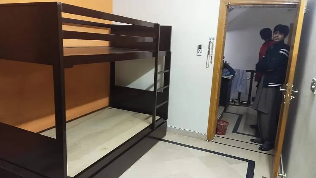 wood bunk size 2.5x5 feet Made of Malaysian pine wood 7 years warranty 7