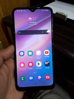 Samsung A10s with finger