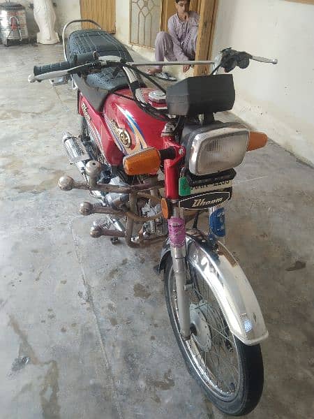 Yamaha Dhoom 70 cc 3