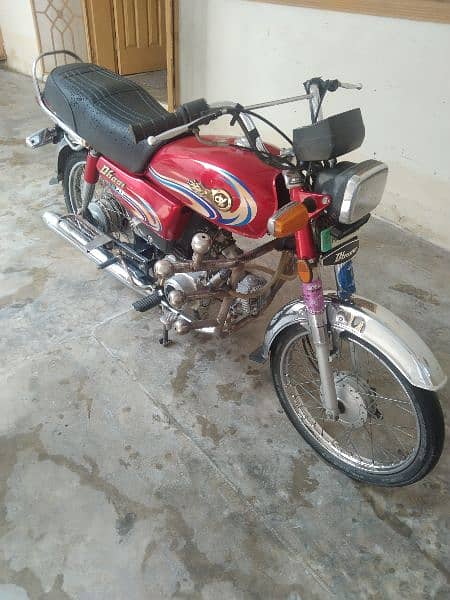 Yamaha Dhoom 70 cc 8