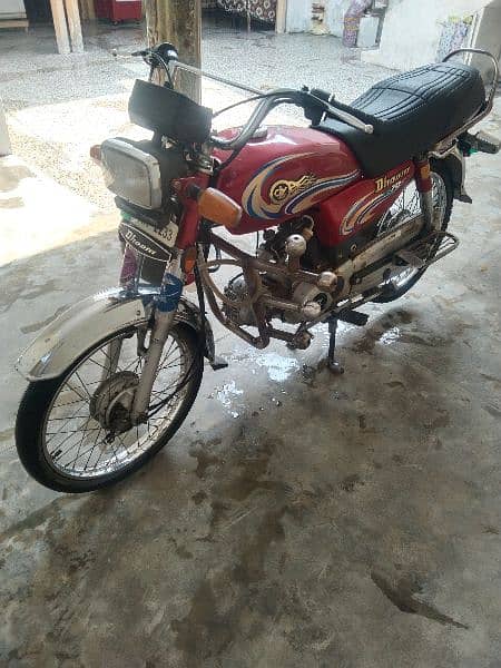 Yamaha Dhoom 70 cc 9