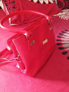 hand bag in red color
