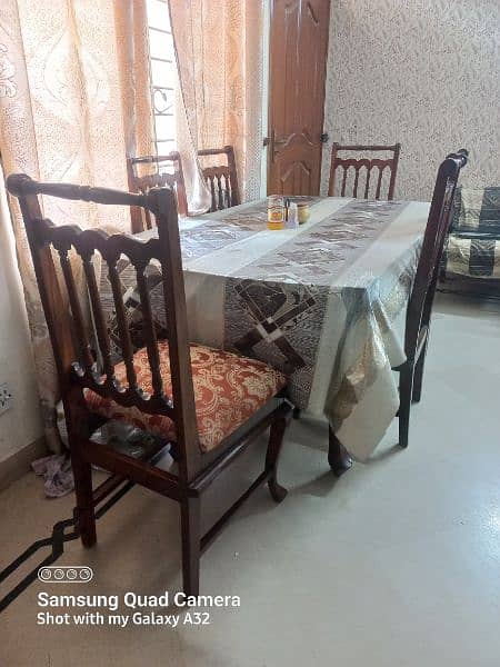Excellent condition 6 chairs Dining table. 2