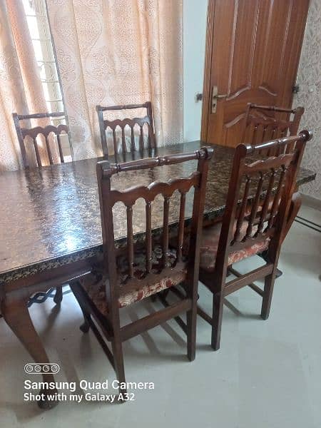 Excellent condition 6 chairs Dining table. 3